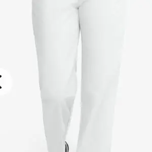 Pair of white pants with a clean, tailored fit.